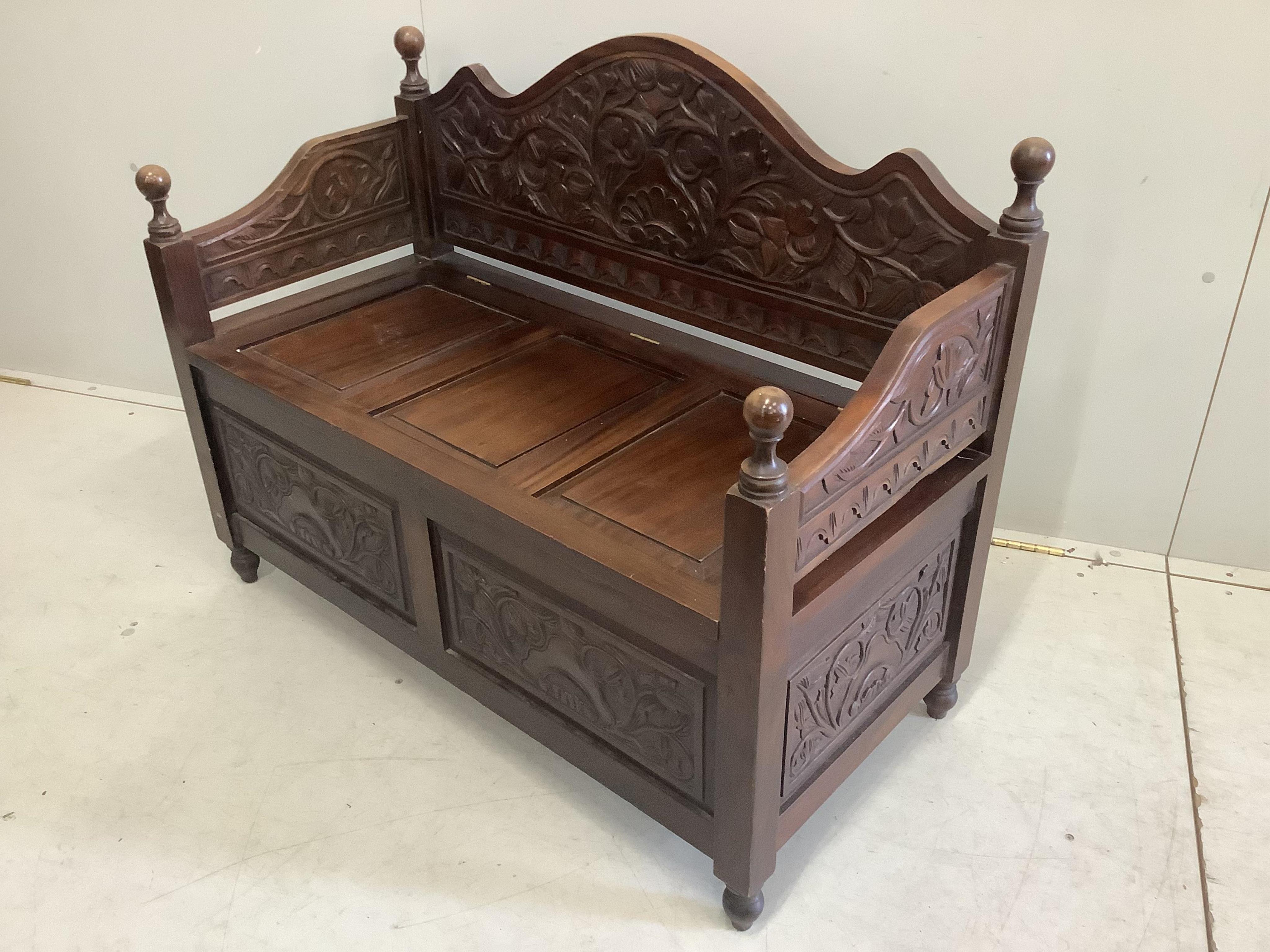 A pair of hardwood monks benches, width 100cm, depth 48cm, height 75cm. Condition - good